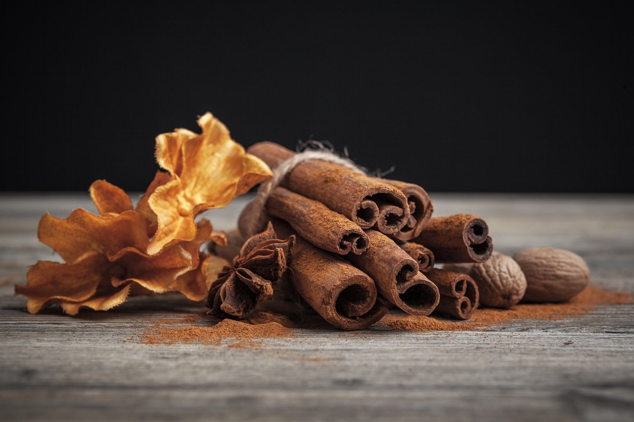 cinnamon sticks on wooden background creative pho 2023 11 27 04 51 22 utc