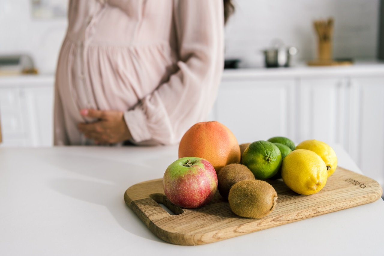 cropped view of pregnant woman touching belly near 2023 11 27 04 55 28 utc