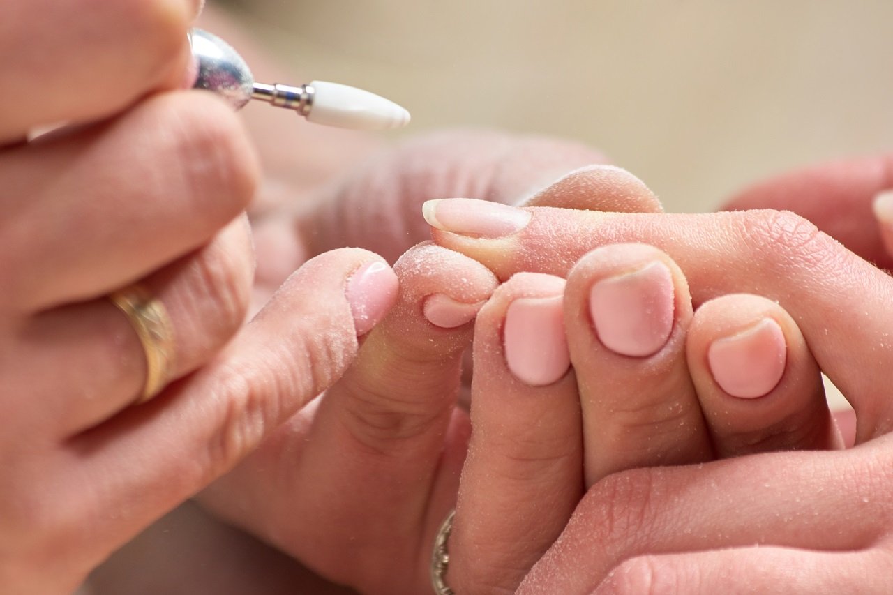 manicurist making hardware manicure 2024 09 17 07 14 54 utc